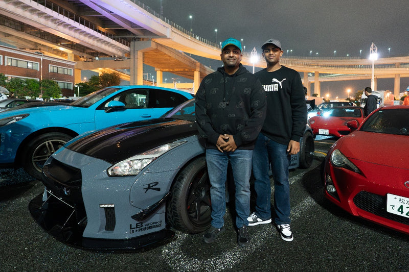 Father and son with a Liberty Walk GT-R at Daikoku car meet